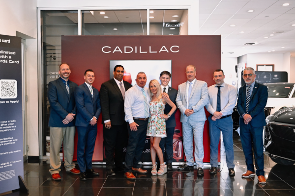 Lyriq Test Drive Group Photo with Cadillac Sign