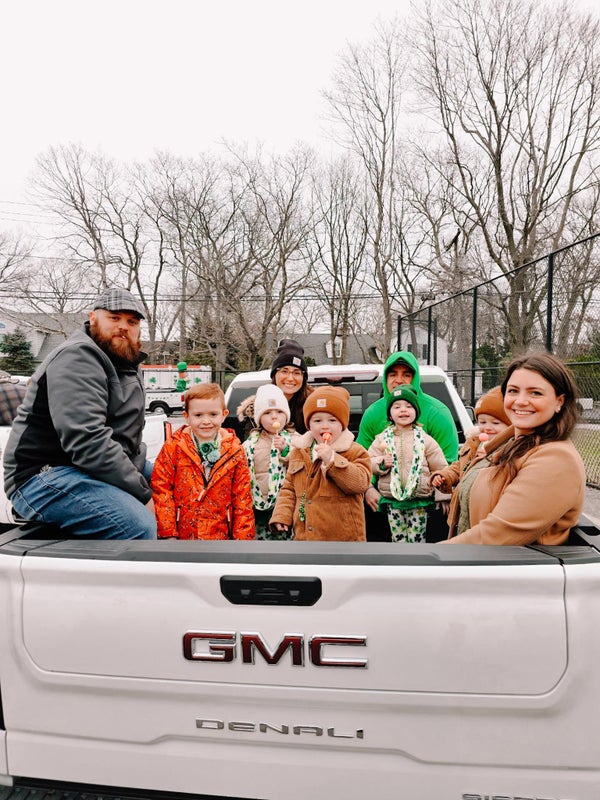 Saint Patrick's Day Parade family in back of truck