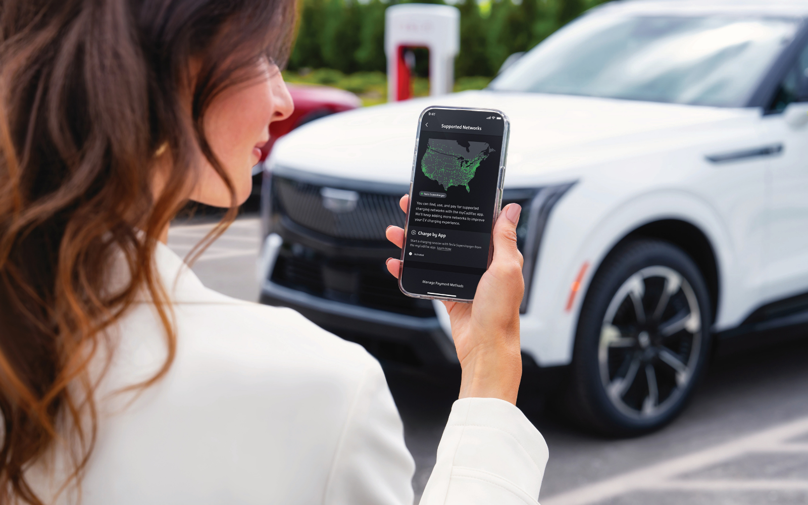 Woman viewing a map displaying available chargers