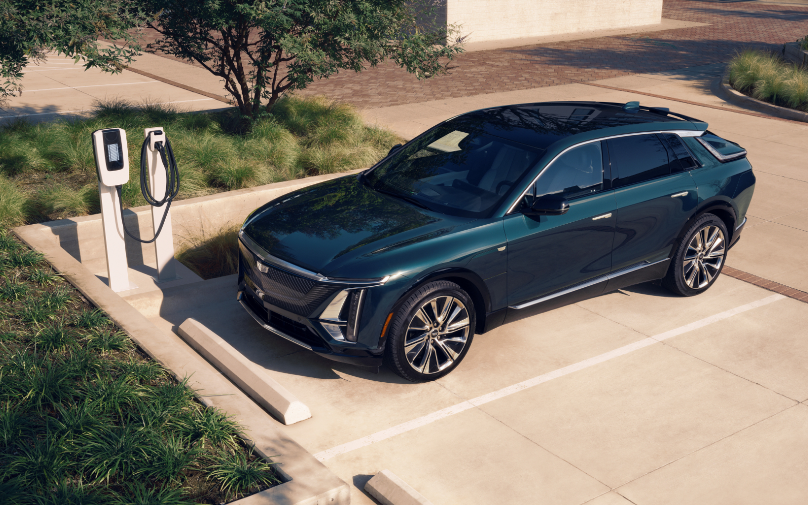 Cadillac LYRIQ plugged into a charger